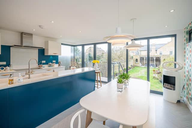 The contemporary extension houses a large kitchen/diner with views over the garden