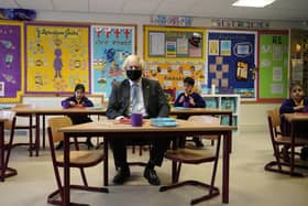 Boris Johnson during a classroom visit earlier this month prior to the reopening of the country's schools.
