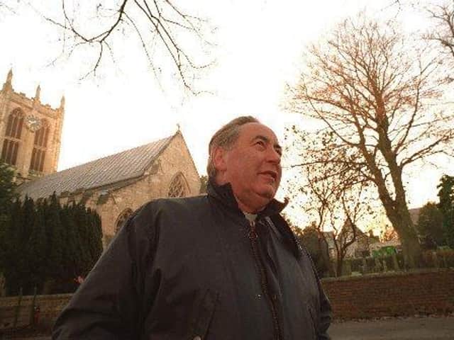 File pic: Canon Terence Grigg outside St Mary's, Cottingham