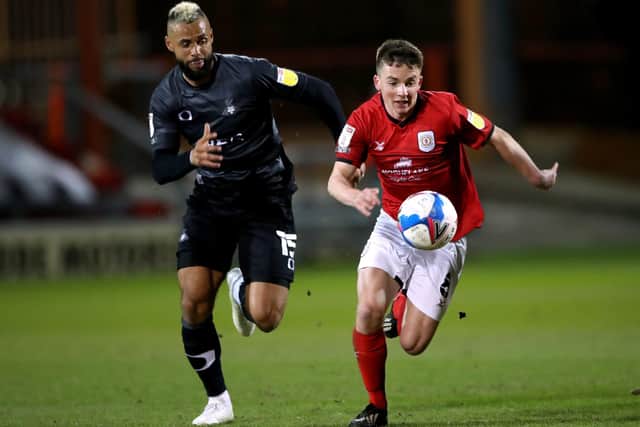 TOO SOON: Doncaster Rovers' midfielder John Bostock, left, will not be fit for tonight’s trip to Oxford, but Andy Butler is hopeful he will return for the weekend. Picture: Nick Potts/PA.