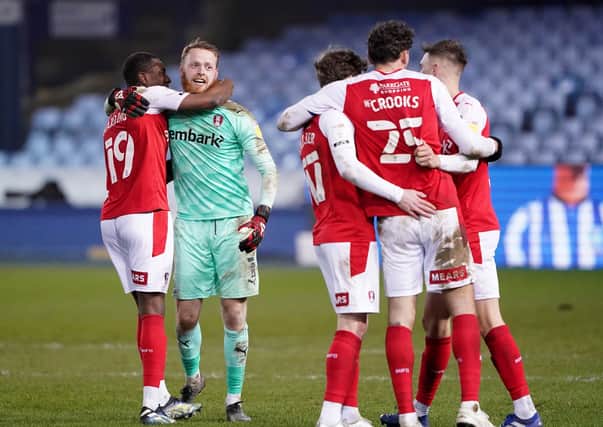 BACK IN THE GAME: Rotherham's players celebrate after their win at Sheffield Wednesday on March 3 - their last match. Picture: Zac Goodwin/PA