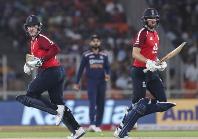 England's Dawid Malan, right and Jason Roy, run between the wickets during the second Twenty20 international against India in Ahmedabad. Picture: AP/Aijaz Rahi