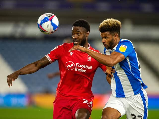 RECEPTIVE: Carlos Corberan has enjoyed working with Huddersfield Town striker Fraizer Campbell, right