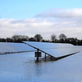 File photo of solar panels in floodwater in East Cowick,Yorkshire. Photo: PA