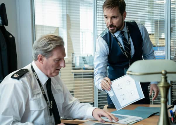 Adrian Dunbar as Superintendent Ted Hastings, Martin Compston as DS Steve Arnott. Picture: PA Photo/BBC/World Productions/Steffan Hill.