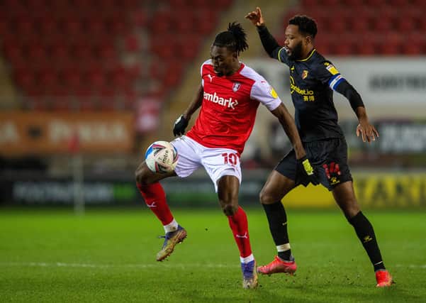 On the ball: Freddie Ladapo and Nathaniel Chalobah challenge for possession. Picture: Bruce Rollinson