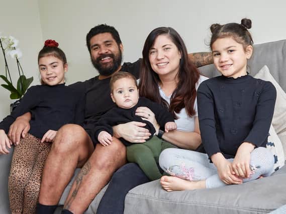 Mose Masoe, partner Carrisa and their children at home.