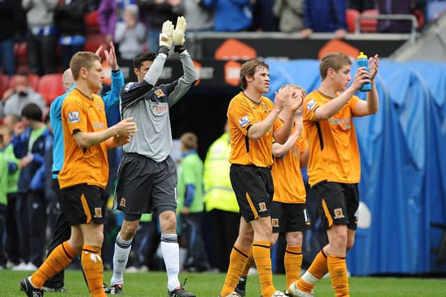 Hull City players including Kevin Kilbane (second right) applaud the fans at the final whistle during the Barclays Premier League Match at the DW Stadium, Wigan, which aw them relegated in 2010 (Picture: PA)
