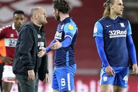 Preston midfielder Alan Browne pleads his innocence after his controversial red card at Middlesbrough, while manager Alex Neil looks furious. Picture: PA.