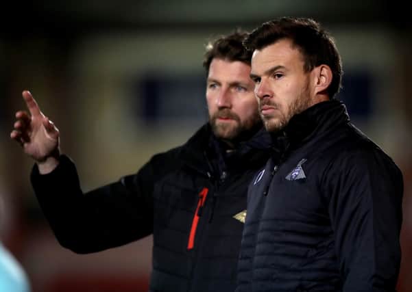 Doncaster Rovers interim manager Andy Butler (right) and goalkeeping coach Paul Gerrard.