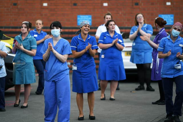 NHS staff joined a Clap for Carers celebration outside Leeds General Infirmary during the first lockdown.
