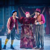 Mitesh Soni (Charley), Caroline Parker (Fagin) and Nadeem Islam (Artful Dodger) in Oliver Twist. (Photography by Anthony Robling).