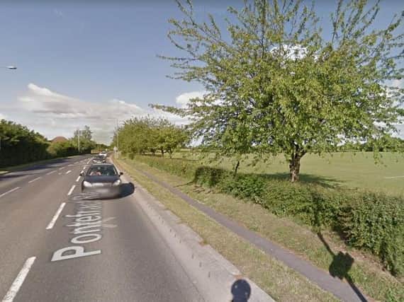 The 11-year-old boy was walking in a field close to Pontefract Road in Snaith, on Monday when a man is alleged to have followed him and tried to grab him twice.