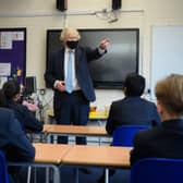 Prime Minister Boris Johnson answers questions from pupils from Colham Manor primary school at a surprise Q&A session during a constituency visit as he is urged to make education integral to his 'levelling up' strategy.