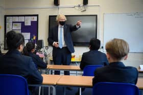 Prime Minister Boris Johnson answers questions from pupils from Colham Manor primary school at a surprise Q&A session during a constituency visit as he is urged to make education integral to his 'levelling up' strategy.