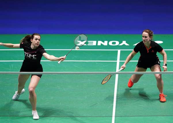 Out: England’s Jenny Moore, left, and Jessica Hopton were beaten 21-18 21-7 by Malaysian pair Pearly Tan and Thinaah Muralitharan in the YONEX All England Championships. Picture: Zac Goodwin/PA Wire.