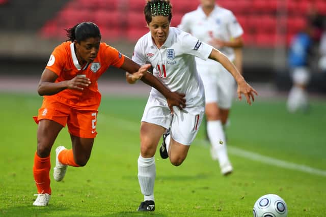 From grassroots to international: Holland's Dyanne Bito  tries to tackle England's Sue Smith. Picture: Getty Images