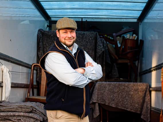 Angus Ashworth star of The Yorkshire Auctioneer getting ready to load his van