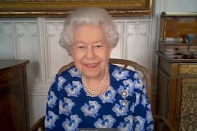 Queen Elizabeth II during a video call with the Duchess of Cornwall to thank volunteers from the Royal Voluntary Service (RVS)
