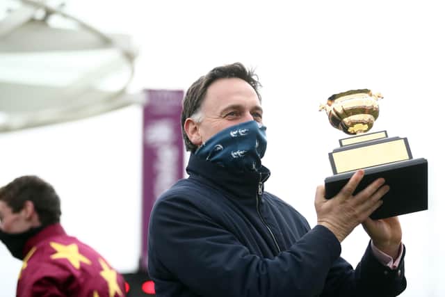 Henry de Bromhead lifts the WellChild Gold Cup after a historic week for Irish racing.
