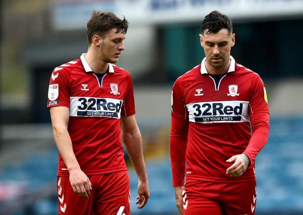 Blow: Middlesbrough's Grant Hall, right, appears dejected after scoring an own goal. Pictures: PA