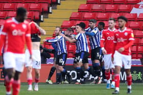 Sheffield Wednesday players celebrate Jordan Rhodes's opener at Oakwell. Picture: PA.