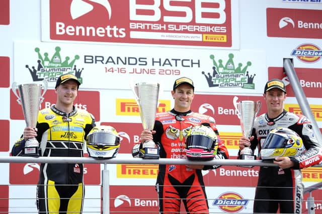 Seeking more podium finishes: Runner-up Dan Linfoot, winner Josh Brookes and third-placed Tommy Bridewell  with their respective trophies following Race One of the British Superbike Championship at Brands Hatch on June 16, 2019. Picture: Getty Images