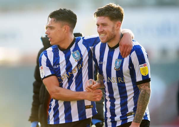 Victory: A win at last for delighted Joey Pelupessy and Josh Windass. Pictures: Steve Ellis