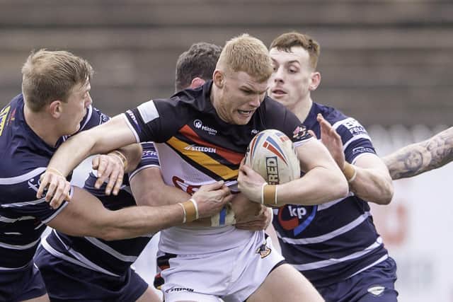 Trapped:  Bradford's Joe Brown is tackled by Featherstone.'s Craig Kopczak. Picture by Allan McKenzie/SWpix.com