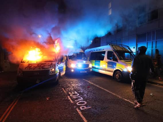 What started as a non-violent demonstration on Sunday afternoon turned violent after hundreds of protesters descended on the New Bridewell police station.