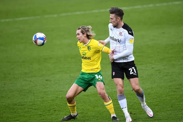 Rotherham United's Angus MacDonald (right) battles with Norwich's Tood Cantwell. Picture: Joe Giddens/PA