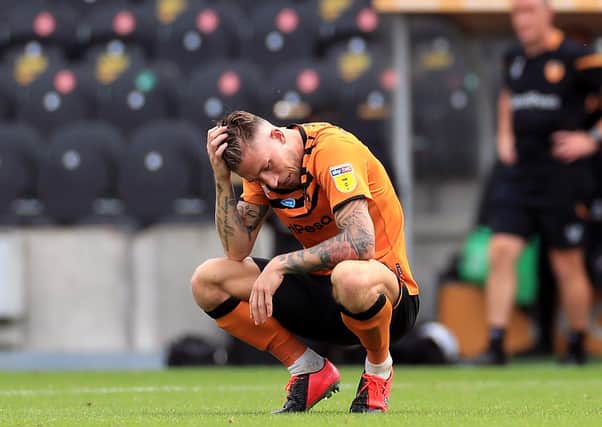 Angus MacDonald shows his frustration after relegation with Hull City in July last year. Picture: Mike Egerton/PA