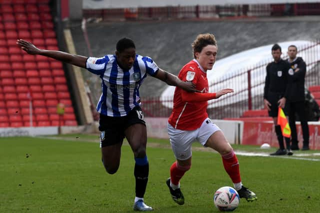 No way: Barnsley player Callum Styles is challenged by Osaze Urhoghide. Picture: Simon Hulme