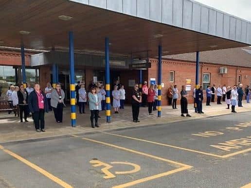 Pictured, member of staff hold a one minute silence this morning at Bridlington Hospital. Photo credit: Submitted photo