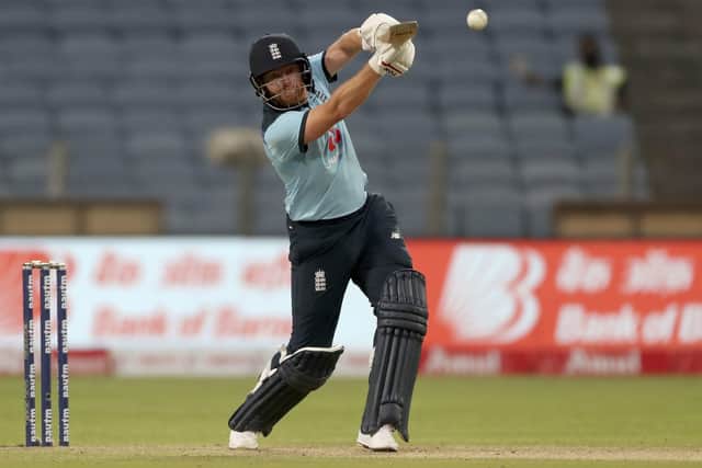 England's Jonny Bairstow plays a shot during the first One Day International cricket match between India and England at Maharashtra Cricket Association Stadium in Pune. (AP Photo/Rafiq Maqbool)