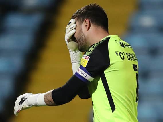 Bradford City captain Richard O'Donnell can't hide his disappointment after seeing his side go 2-0 down at Scunthorpe United. Pictures: Getty Images