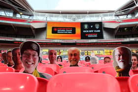 Empty Wembley: Harrogate fans are seen on cardboard cutouts in the empty stands during the Vanarama National League play-off final match between Harrogate Town and Notts County. Picture: Catherine Ivill/Getty Images