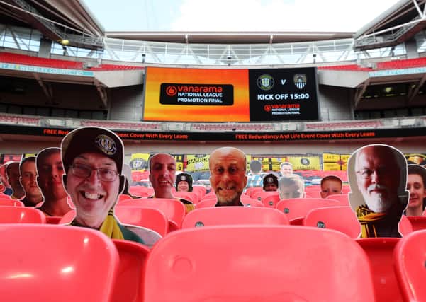 Empty Wembley: Harrogate fans are seen on cardboard cutouts in the empty stands during the Vanarama National League play-off final match between Harrogate Town and Notts County. Picture: Catherine Ivill/Getty Images