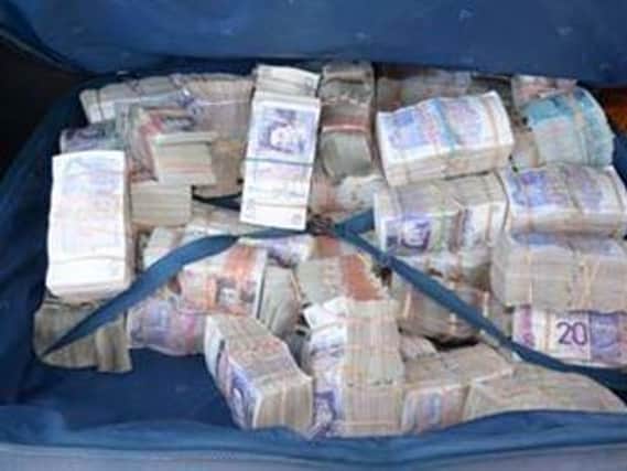 Over £1.1 million was found stashed in two suitcases in the boot of the car.