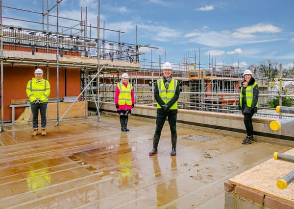 Celebrating the topping out of Springfield’s new care home in Harrogate are: L-R Neil Silcock (Simpson), Sally Rasmussen (Springfield Healthcare), Graeme Lee (Springfield Healthcare) and Jo Hawkins-Spencer (Projex Building Solutions).