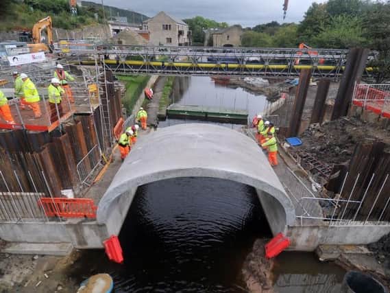 Part of the new Elland Bridge, which was destroyed in the Boxing Day 2015 floods, put into place in September 2016. Picture: Tony Johnson.