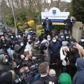 Protesters give a statement to members of the media outside Batley Grammar School in Batley, West Yorkshire, where a teacher has been suspended. Pic: PA