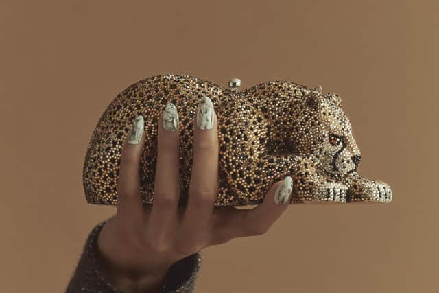 Judith Leiber in New York has made three jewelled animal-shape clutch bags – a leopard, sausage dog and a snail. 
Edward Crutchley AW21 by Gomez de Villaboa 
Styled by Julian Ganio