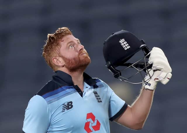 Up to the heavens: England’s Jonny Bairstow looks skywards in celebration after smashing a century against India in the second One Day International at Maharashtra Cricket Association Stadium in Pune yesterday. (Picture: AP/Rafiq Maqbool)