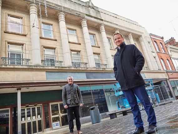 Wykeland Group Development Surveyor Tom Watson, right, with Sean Carrison, Managing Director of Kingston Cleaning Services, outside Hull’s former M&S store, which is owned by Wykeland. They are pictured during a programme of cleaning works Wykeland carried out on landmark buildings it owns in Hull city centre earlier this year.