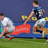 Victory: 
Jack Broadbent scores the winning try for Leeds Rhinos. Picture: Steve Riding