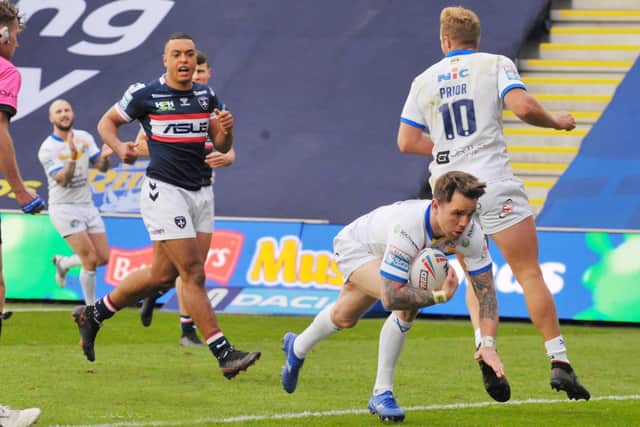 Going over: 
Richie Myler scores a  try for Leeds Rhinos. Picture: Steve Riding