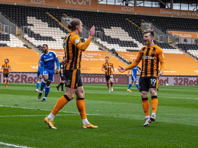 Hull City striker Tom Eaves celebrates his opener with Keane Lewis-Potter. PICTURE: TONY JOHNSON.