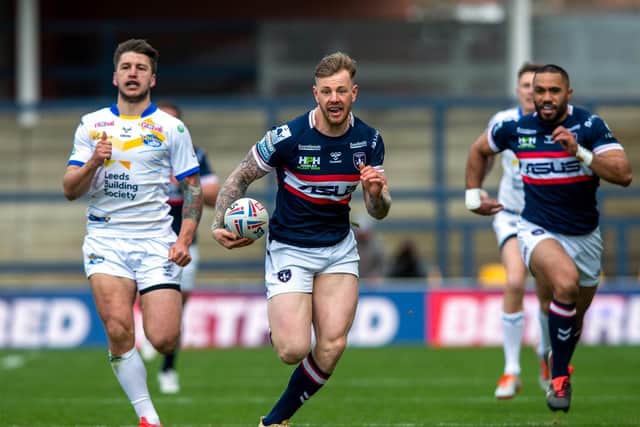 Wakefield Trinity's Tom Jojhnstone races away for his stunning opening try against Leeds Rhinos. (PIC: BRUCE ROLLINSON)