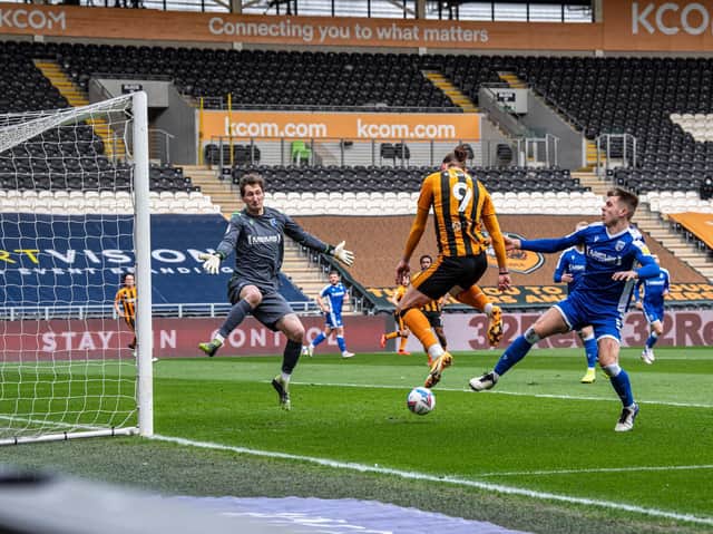 Hull City striker Tom Eaves heads the hosts in front against Gillingham. PICTURE: TONY JOHNSON.